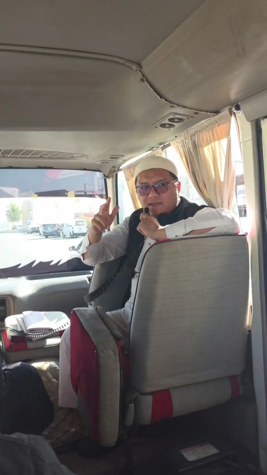 Pilgrims travelling together by bus