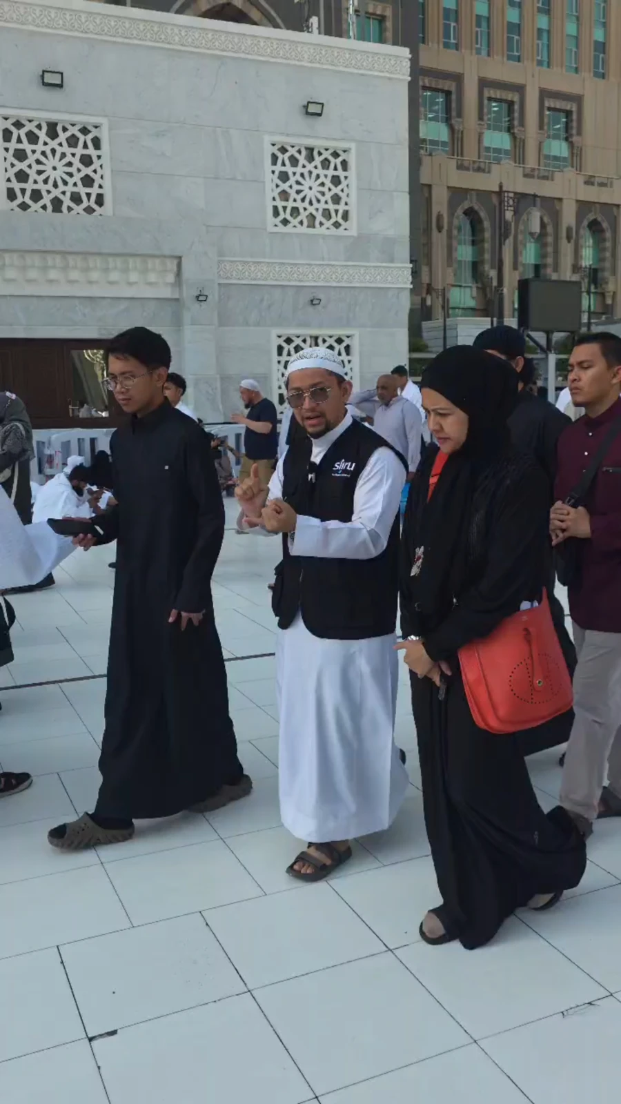 Pilgrims outside a mosque
