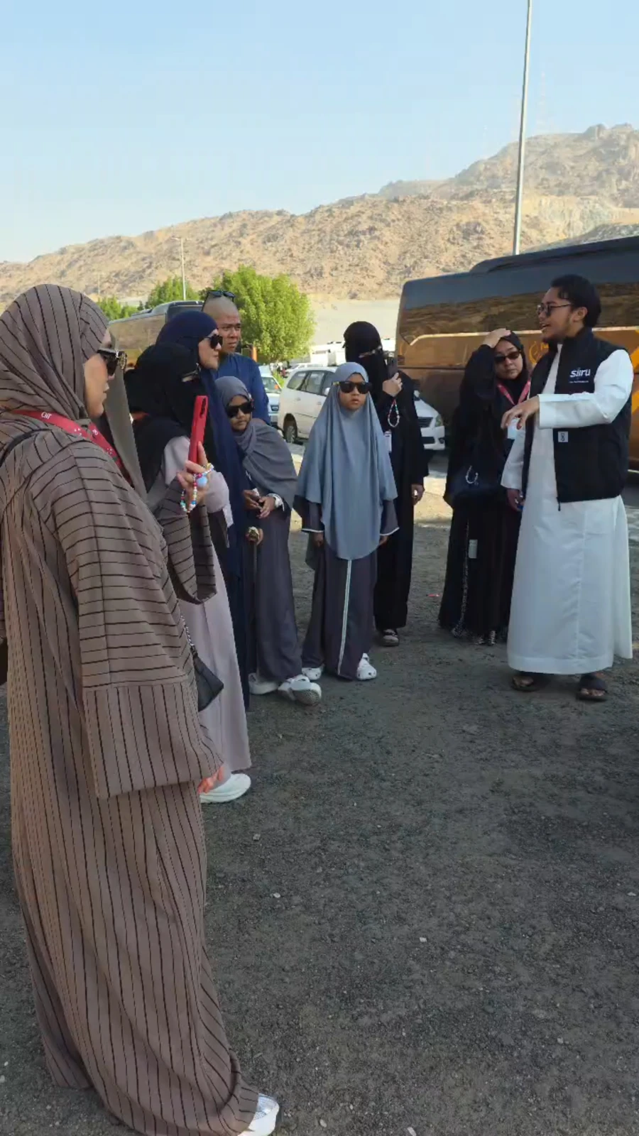 A guide with a group of pilgrims
